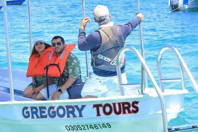 2 in 1 Tour | Arc Tour with Beach Drop - Cabo’s rock cathedral, seen from the water