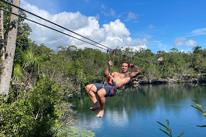 4 Private Cenotes, Zip-Lines, Canoes & Mayan Village with Delicious Lunch - Zip-lines and cliff jumps in the jungle