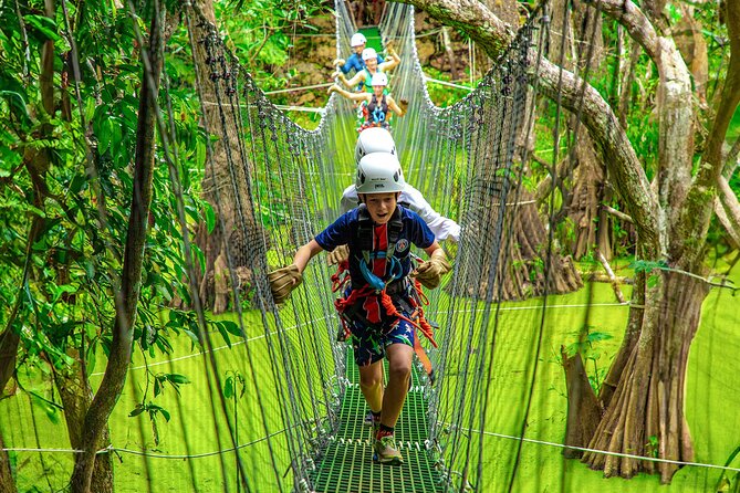 Adrenaline Adventure, Zip Line, ATV and Cenote Maya - Riding a Can-Am Outlander through jungle trails