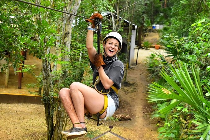 Adrenaline Tour with ATV, Ziplines and Cenote from Cancun - ATV riding on rough jungle trails