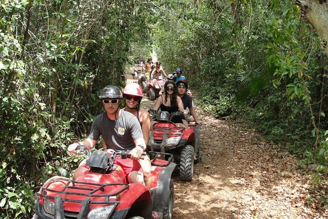 ATV Adventure Combo with Snorkeling, Ziplines, Cenote, and Lunch - Swimming in a Mayan cenote