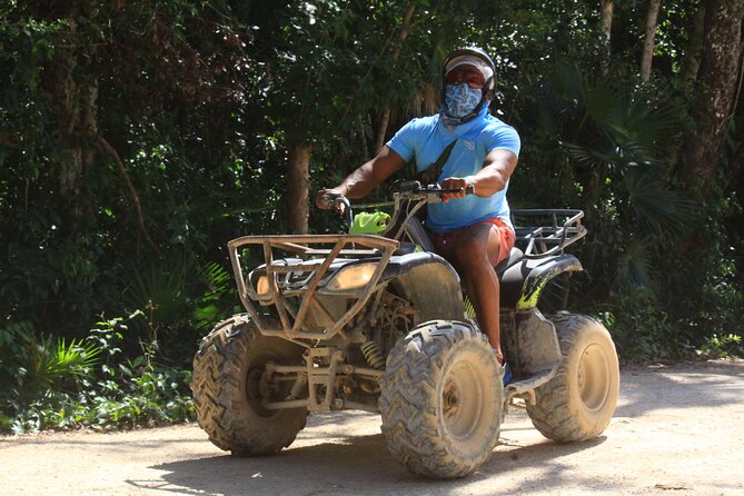 ATV Cenote and Zipline Sacred Jungle Expedition - Cooling Off in the Cenote