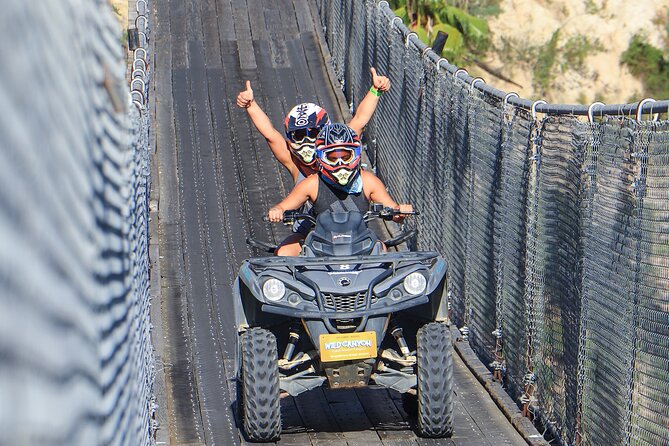 ATV Off-Road Adventure, Cross the Wooden Bridge & Feel the Thrill - Getting fitted with helmets and protective gear