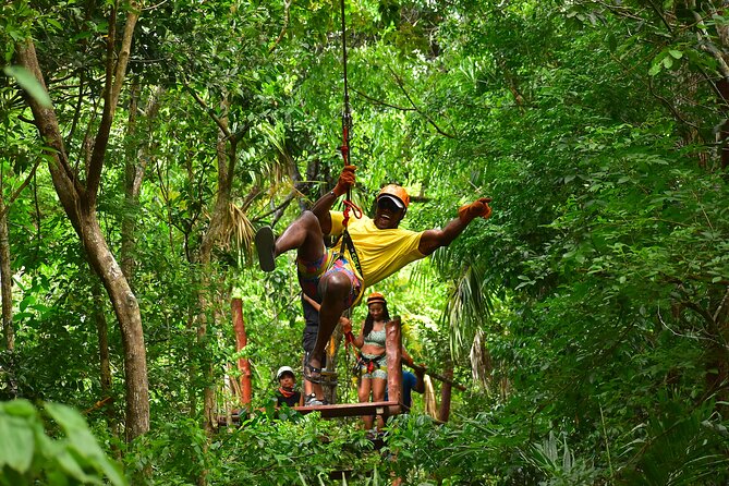 ATV Tour with Cenote swim, Ziplines, Transportation and Lunch Included - Entering the cenote by ladder, platform, or zipline