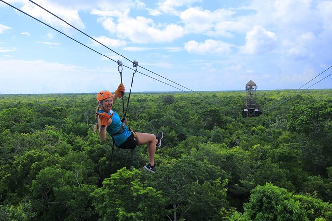 ATV Xtreme and Zipline Adventure from Riviera Maya - Ziplining through the rainforest canopy