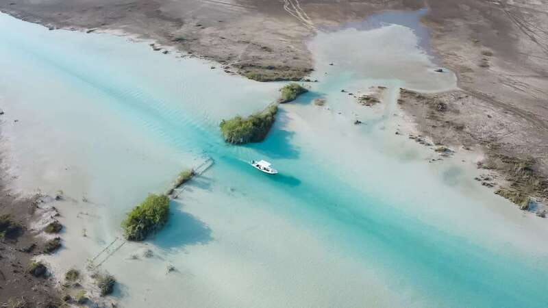 Bacalar: 3 Hour Boat Trip with Swimming & Drinks - Cenote Negro and Bacalar’s dark-blue center