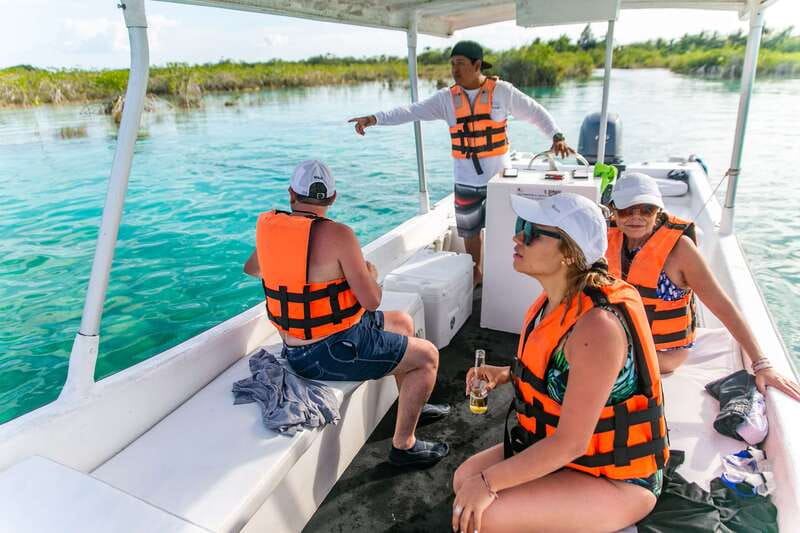 Bacalar: 3 Hour Boat Trip with Swimming & Drinks - Drinks, music, and the feel onboard