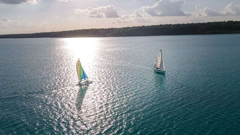 Bacalar: Group Sailing Tour with Guide - Black Cenote: a darker pocket in the lagoon