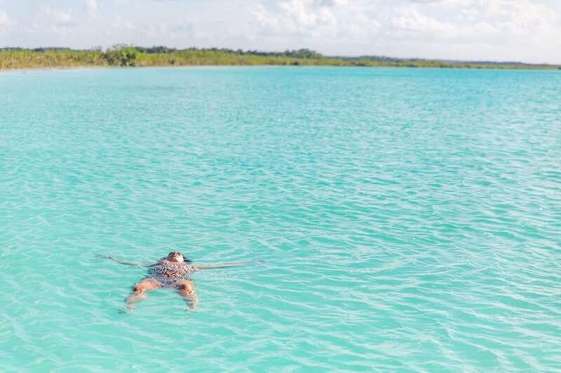 Bacalar: Group Sailing Trip with Swimming and Drinks - Fruit, drinks, and the relaxed pace