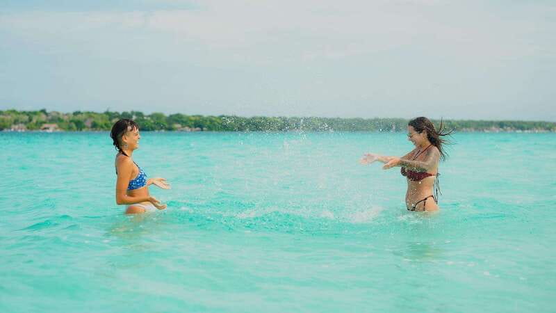 Bacalar Lagoon Sightseeing Boat Tour with Open Bar & Snack - The secret stop, fruit, and possible sunset