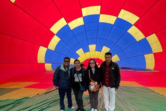 Balloon flight + pick up in CDMX + Breakfast in Cave + Pyramids - The balloon toast and flight certificate