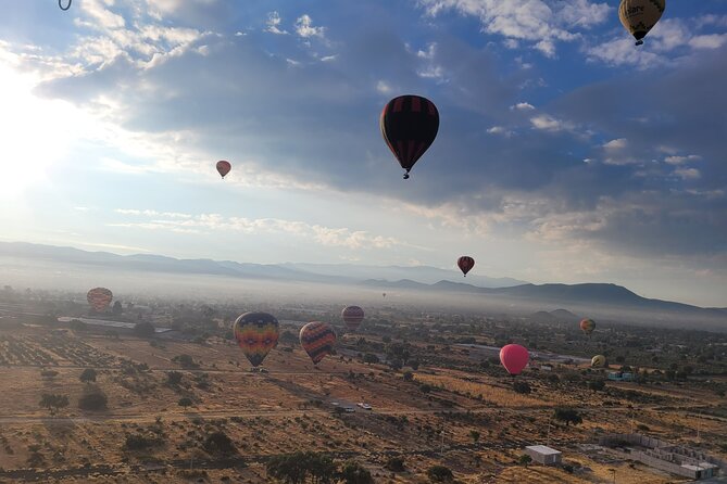 Balloon flight + Transportation + Breakfast in Cave or buffet + Pyramids - Pickup, timing, and the six-to-seven-hour schedule