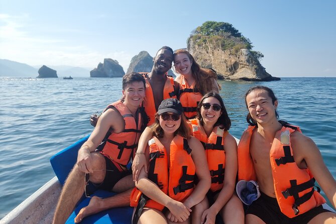 Boat and Snorkel Tour to 5 Islands of Los Arcos - Boarding the panga at Mismaloya