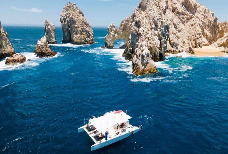 Cabo Catamaran Snorkel: Arch & Santa Maria, Open Bar, Snacks - Sailing past Lover’s Beach and the Arch