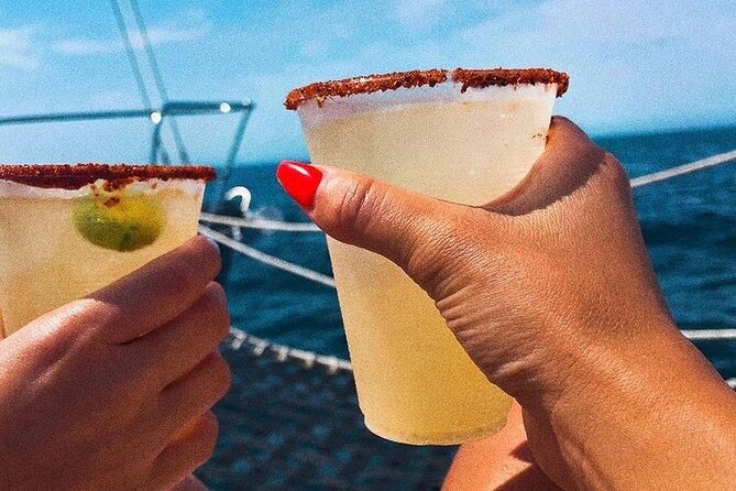 Cabo San Lucas Sunset Cruise with Open Bar and Snacks - Timing, meeting point, and the small extra cost
