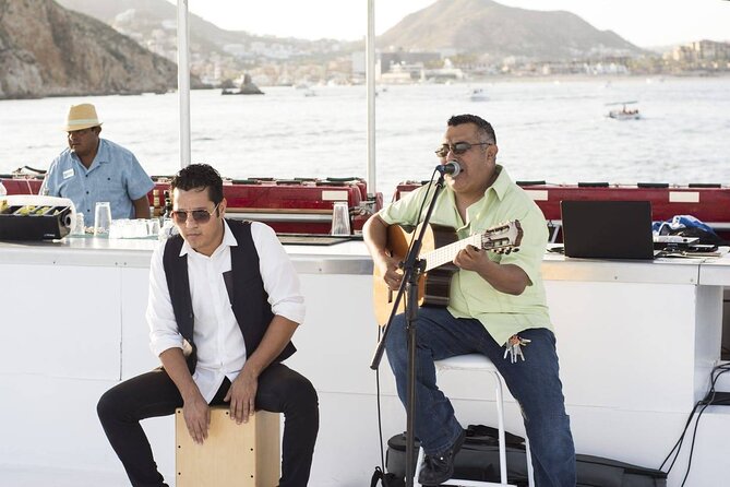 Cabo Sunset Dinner Cruise: Fajitas, Lands End and Party - A party boat after dark