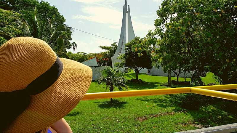Cancun: Guided City Tour with Shopping by Double Decker Bus - Playa Delfines and the colorful Cancun sign