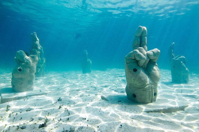 Cancun Half-Day Sailing Catamaran Cruise to Isla Mujeres - The El Meco Reef Snorkeling Stop