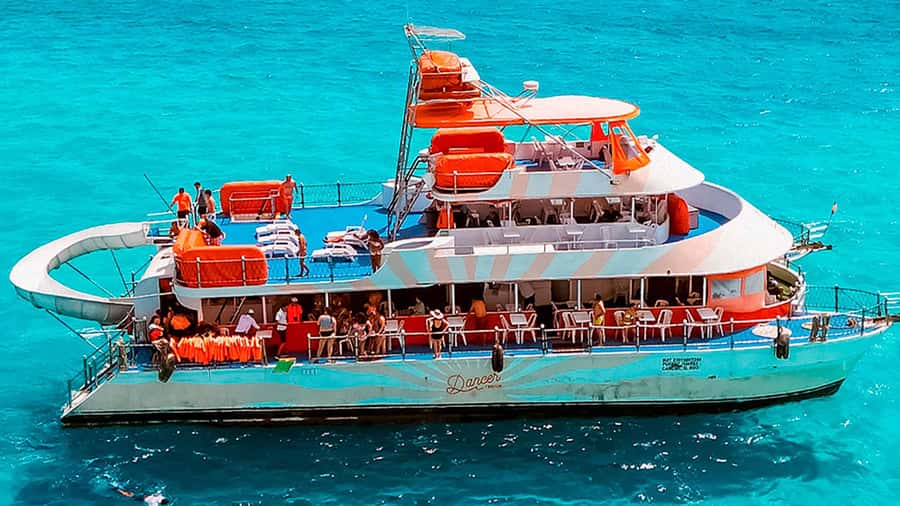Cancun: Isla Mujeres Full Day Dancer Cruise - Meco Reef: snorkeling, swimming, and the slide