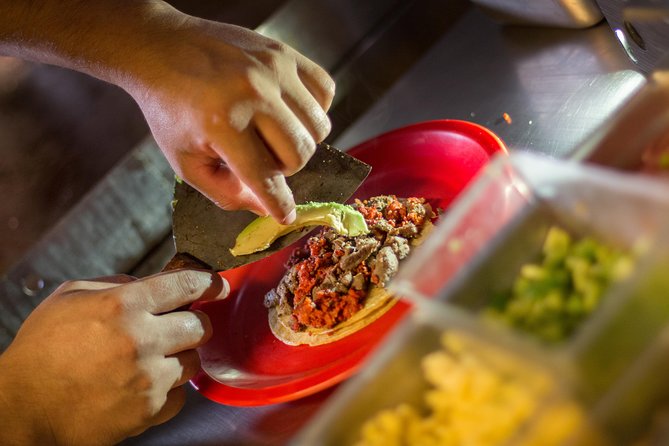 Cancun Taco Tour, Local Beer and Night Market with Transportation - Lonchería El Pocito and the Yucatecan flavor of cochinita pibil