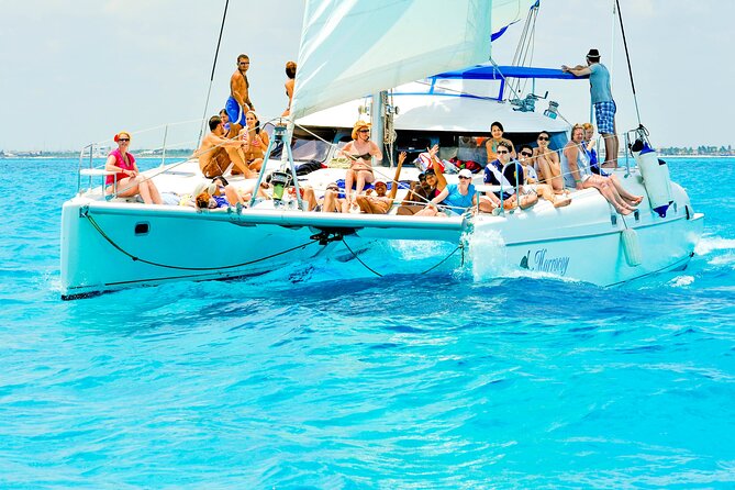 Catamaran to Isla Mujeres Snorkeling Tour with Open Bar and Lunch - Isla Mujeres beach club and the late buffet
