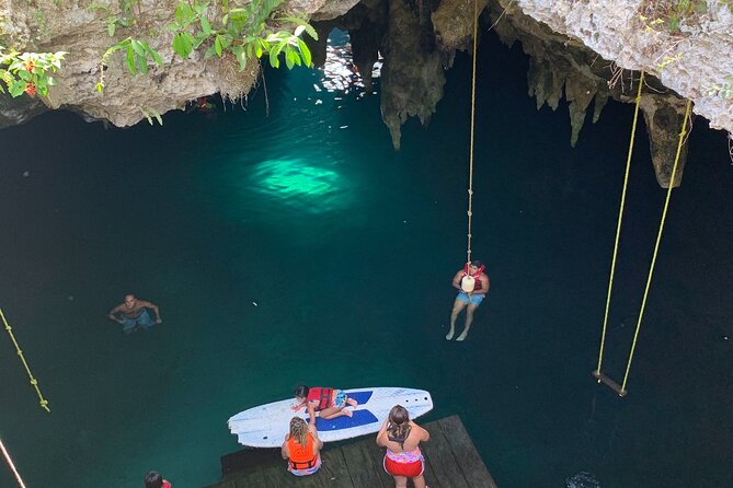 Family ATV Cenote Five Zip Lines Photos Taco Lunch Tequila Taste - Entering the freshwater cave cenote