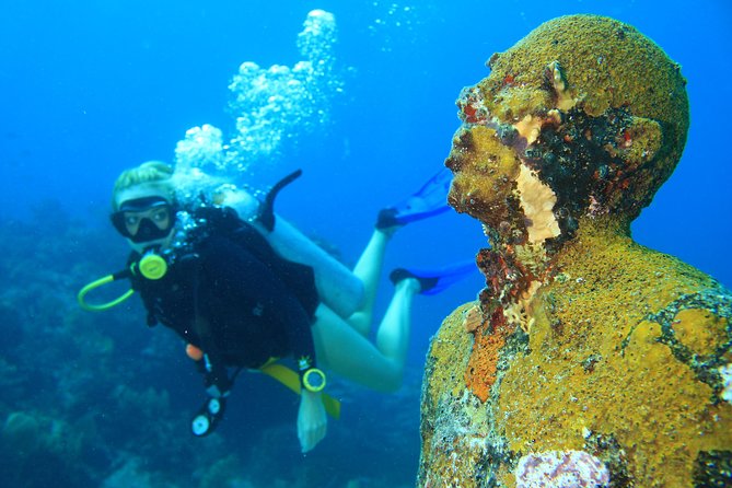 For certified Divers Experience the Under Water Museum and the Manchones Reef - The 12:30 check-in and short ride to the water