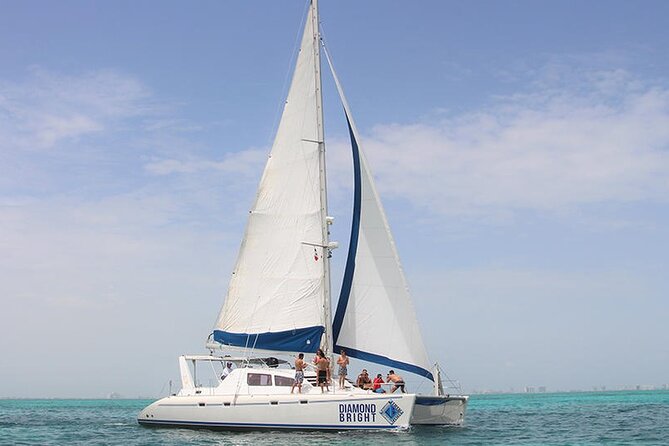 Full-Day Luxurious Catamaran Adventure - Cancún to Isla Mujeres - The Caribbean crossing and onboard atmosphere