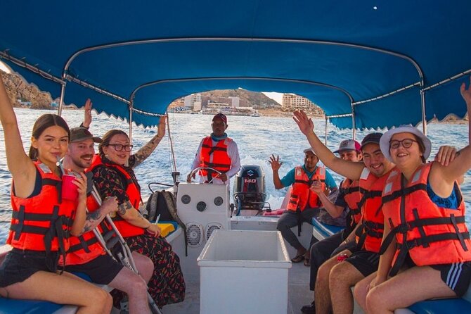 Glass-bottom boat tour to the Arch + beach time - Leaving Cabo’s bay for Lover’s Beach