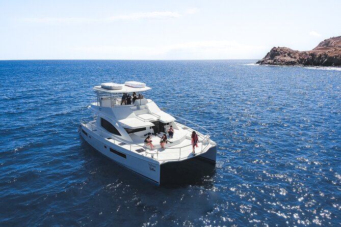 Half Day Cabo Snorkel Adventure with Lunch and Open Bar - Two bays, one catamaran, and a full Cabo morning