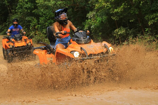 Hidden Cenote Swim & ATV Jungle Adventure with Transportation - Riding the Puerto Morelos forest trails