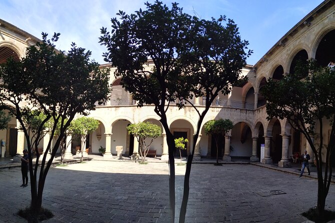History and Murals: Walking Tour Guadalajara - Plaza Tapatía leads toward local commerce