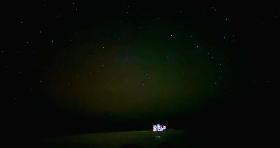 Holbox: Bioluminescence by Kayak and Stargazing. - Walking on a sandbar with glowing footprints