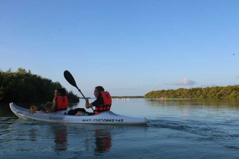 Holbox: Guided Sunrise/Sunset Kayak Tour by Mangrove Reserve - Paddling effort, wet clothes, and smart packing