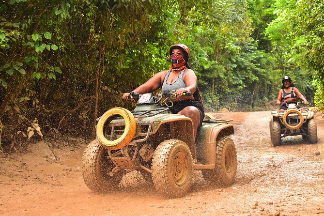 Horseback Riding plus ATV, Cenote, Ziplines, and Lunch - ATV riding on muddy jungle trails