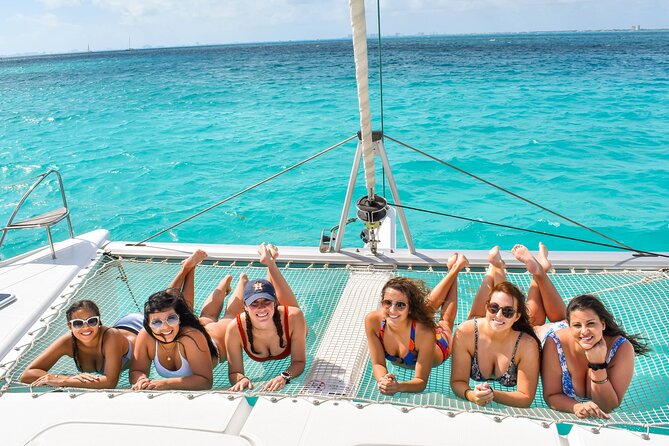Isla Mujeres Catamaran Tour with Snorkel, Open bar and Transport - Buffet lunch and the national open bar