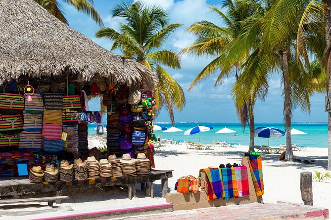 Isla Mujeres Catamaran Tour with Snorkel, Open bar and Transport - Music, crew service, and the social mood