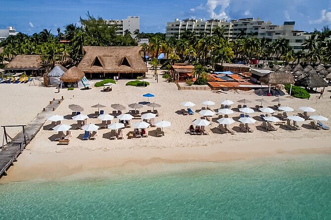 Isla Mujeres luxury catamaran with premium open bar and lunch - The beach club and the meaning of VIP