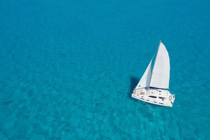 Isla Mujeres Luxury Sailing: Adults Only or Family Friendly - Snorkeling in the Caribbean water