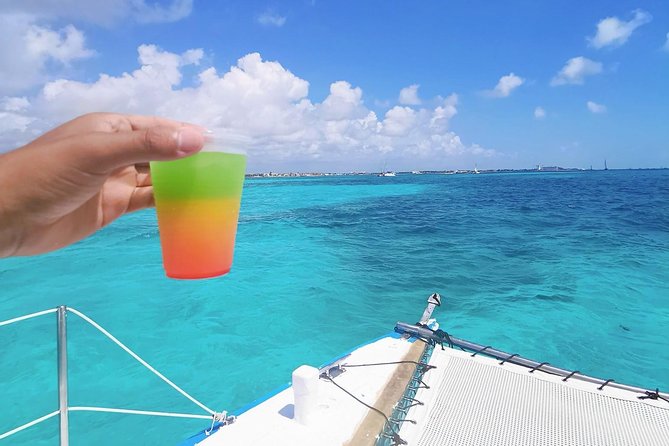 Isla Mujeres Premium Catamaran Tour with transportation from Playa del Carmen - Lunch, drinks, and the social side of the boat