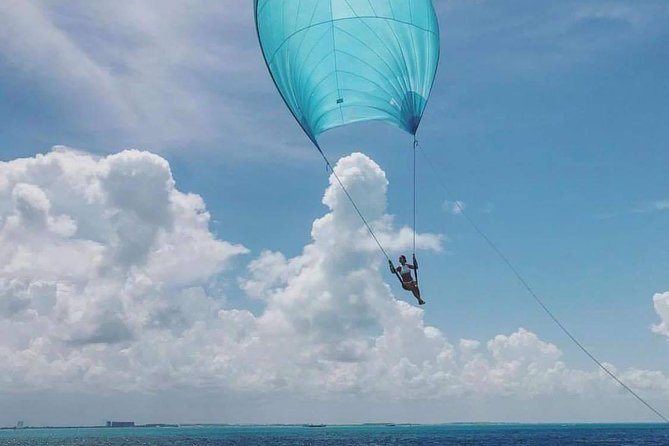 Isla Mujeres Premium Catamaran Tour with transportation from Playa del Carmen - Boarding at Playa Tortugas and meeting the crew