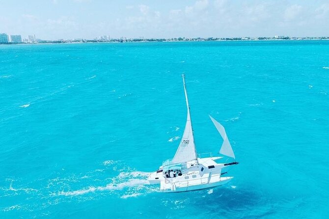 Isla Mujeres Premium Tour in Private Catamaran with Lunch - Snorkeling at El Meco reef