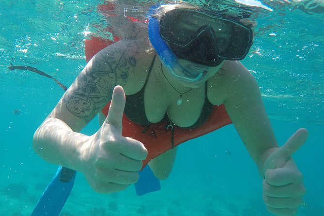 Isla Mujeres Snorkeling Tour Adventure - Lighthouse Reef offers the best chance to see fish