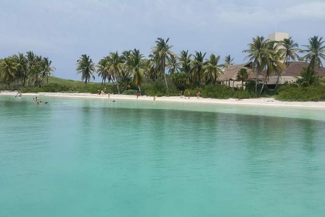 Isla Mujeres Unlimited! Fun & Party with transportation - Boarding at Punta Sam and getting settled