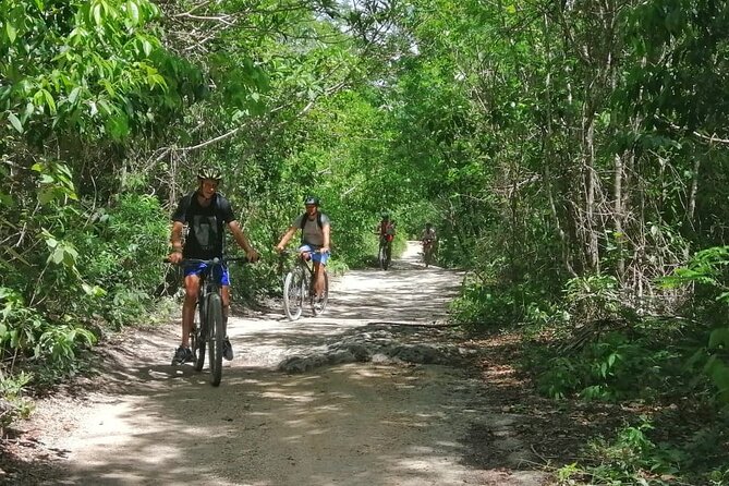 Jungle Bike Tour from Playa del Carmen with Bath in a Cenote - Through the village and into the jungle