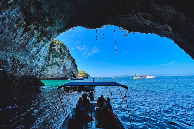 Los Arcos 5 islands Snorkeling Cliff Jumping and Hidden Beach - Cruising under the arches