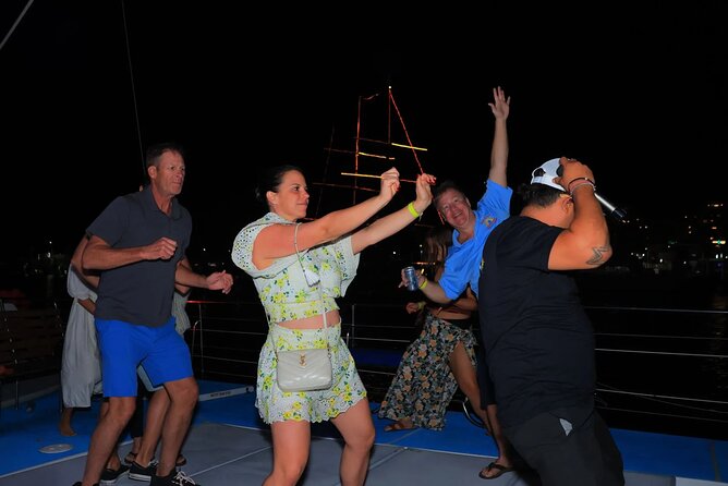 Los Cabos Catamaran Cruise with Open Bar & Light Snack - Open bar, snacks, and the real onboard mood