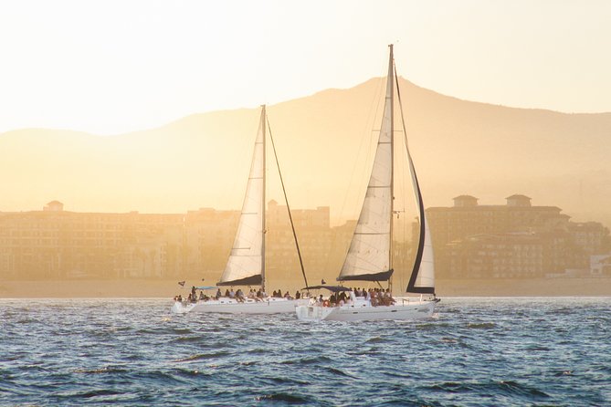 Los Cabos Luxury Sunset Sail with Light Appetizers and Open Bar - Sunset sailing beside Cabo’s most famous rocks