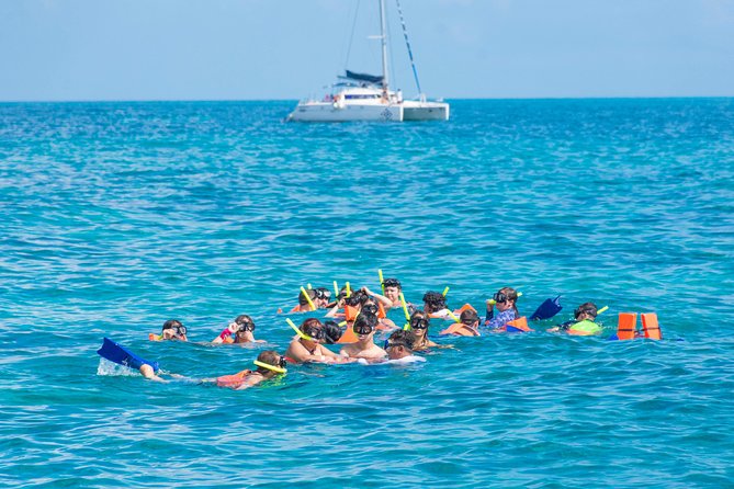 Luxury Catamaran tour to Isla Mujeres with transportation from Playa del Carmen - Starting near Puerto Juarez, with transportation details to confirm