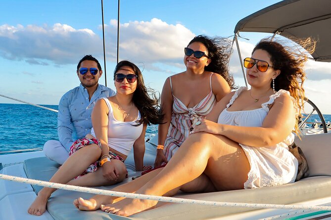 Luxury Sunset Sailing Cruise in Cancun with Light Dinner and Open Bar - Open Bar, Music, and Onboard Service